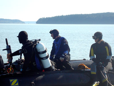 Bill, Steve, and Britt (left to right) preparing to dive.