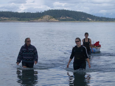 Britt, Erika, and Vera (left to right) returning to the boat to pick up more sensors for deployment.