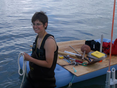 Vera holding our makeshift raft with parts during instrument deployment.